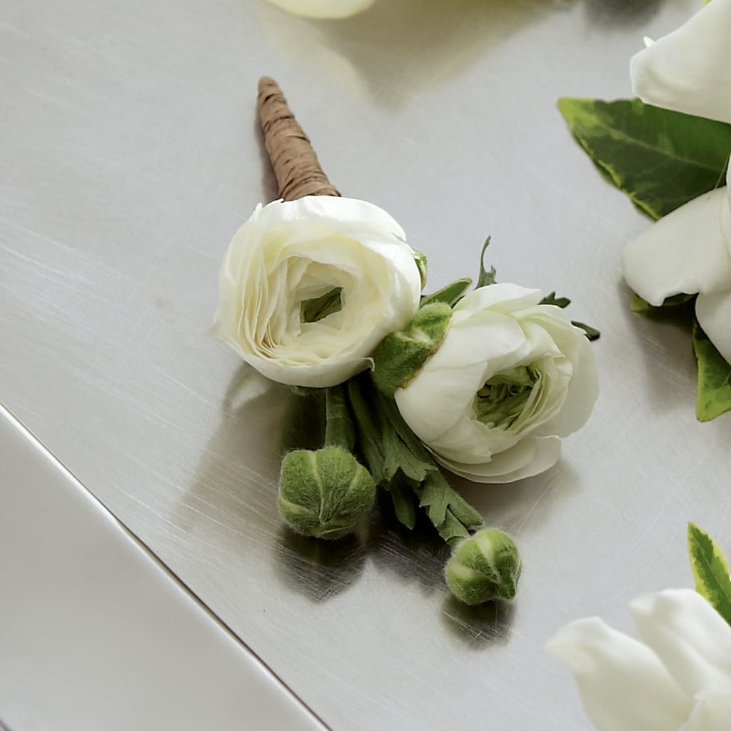 White Ranunculus Boutonniere – Lynchburg Leo Wood Florist, Lynchburg VA